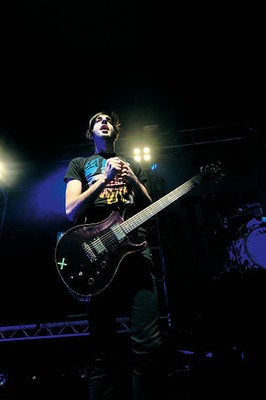 Guitarist Jack Barakat of pop punk group All Time Low performing l- Old Photo