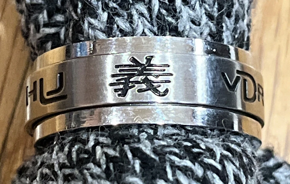 Anillo giratorio de acero inoxidable CTR en 10 idiomas tamaño 12 Foto 3 de 4