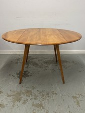 Ercol Oval Drop Leaf Dining Table – Mid Century Solid Wood Table