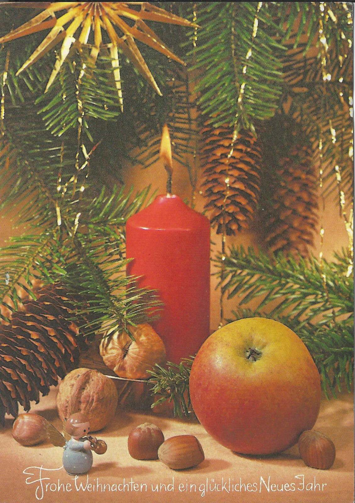 17128 - Postcard showing lit candle, christmas scene