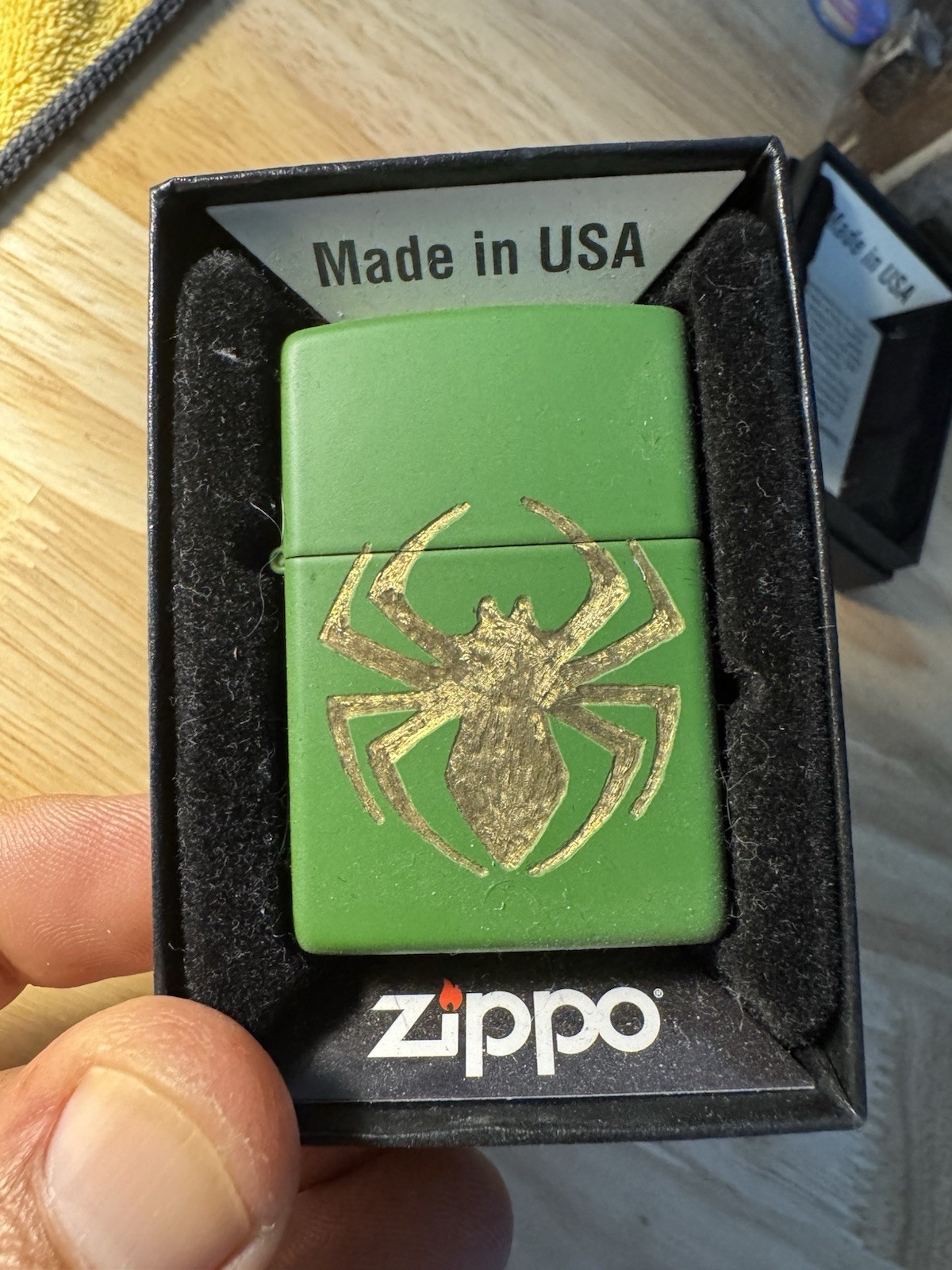 1-spider picture Logo On A Green Zippo Lighter