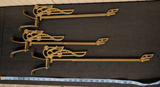 Antique Victorian style swinging rods beautiful brass color with brackets