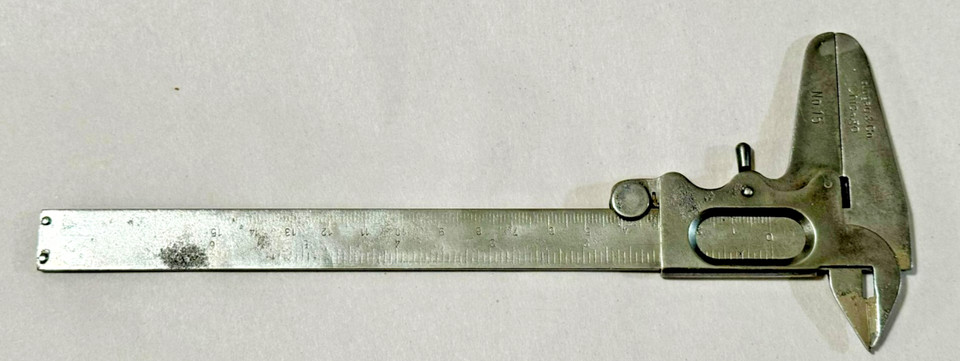 A genuine Glogan & Co. pocket Vernier caliper from Chicago — a precision instrument from the golden age of American manufacturing that's still usable and wildly displayable.