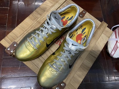gold and silver football boots