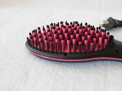 Spazzola raddrizzatrice ceramica Simply dritta nera e rosa vista in TV SHS-300 - Foto 3 di 7