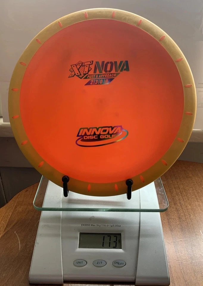 Innova Disc Golf XT Nova Putt And Approach Disc Orange With Yellow Rim 173 Grams - Image 3 of 4