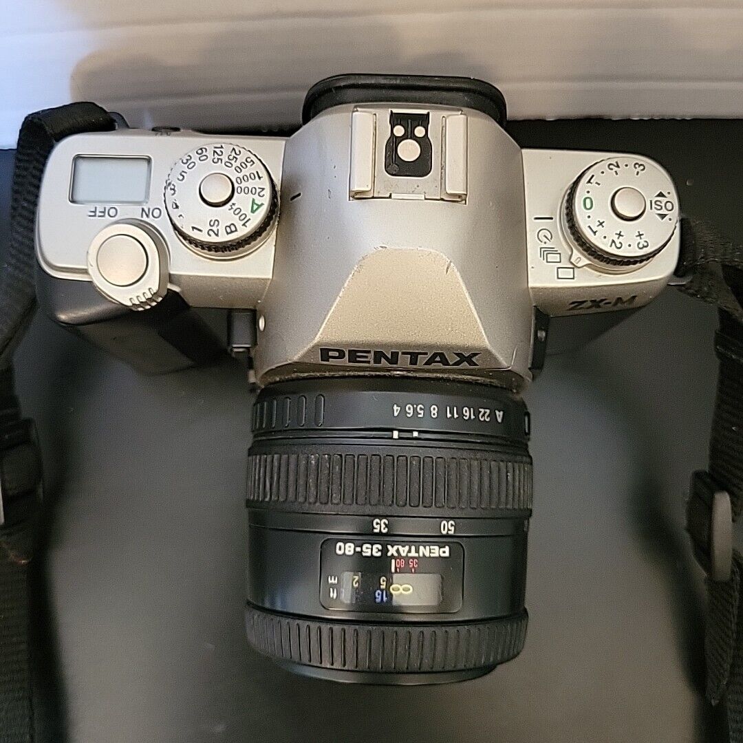 Pentax ZX-M 35mm SLR with Pentax-F 35-80mm Lens For PARTS OR Pentax ZX-M 35mm SLR with Pentax-F 35-80mm Lens For PARTS OR