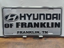 License Plate Tag BOOSTER Vintage Dealer Hyundai Of Franklin Tennessee TN Tenn