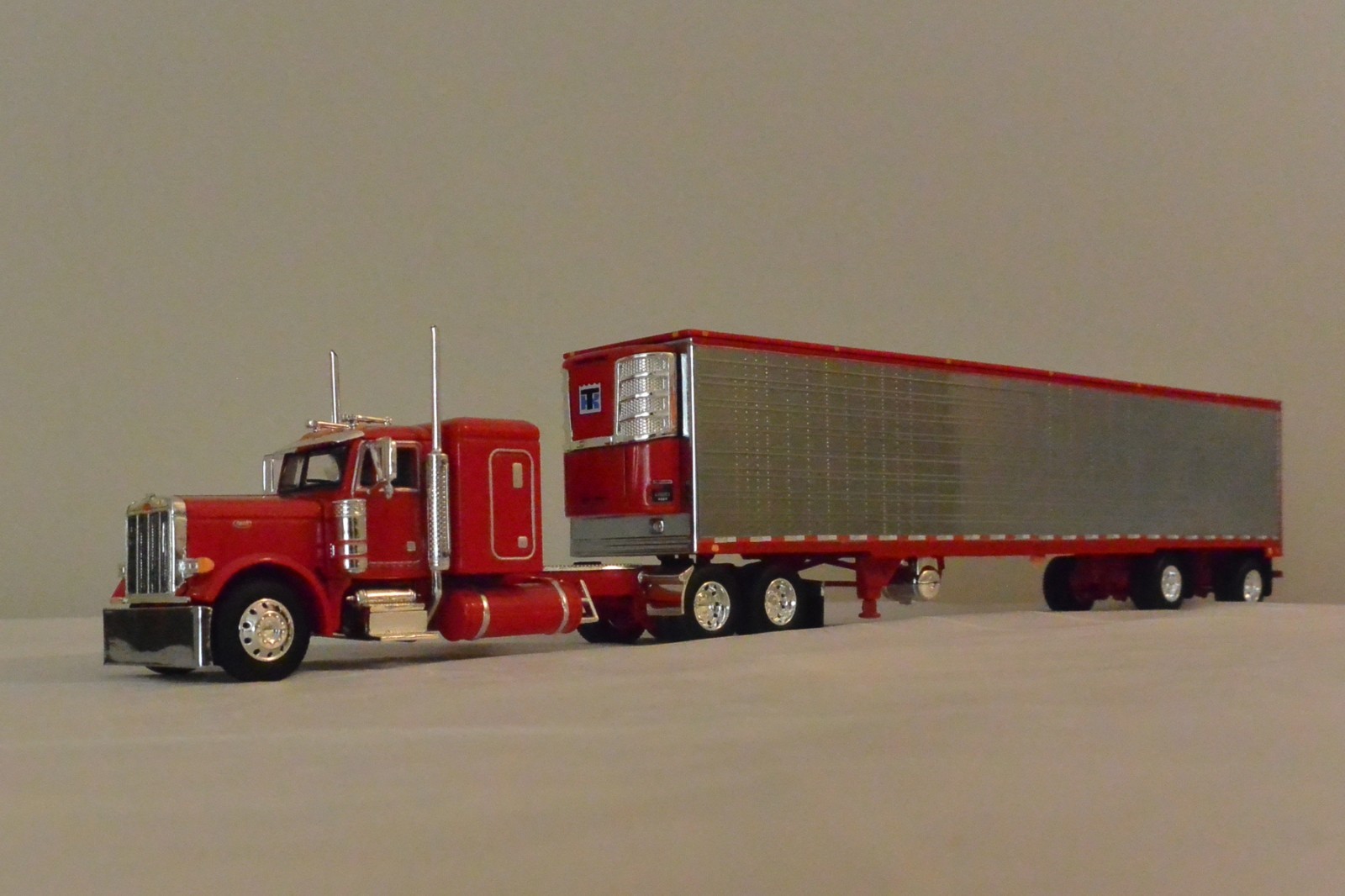 DCP 1/64 Red Peterbilt 379 48" Flat-Top Sleeper & Utility Spread-Axle Reefer
