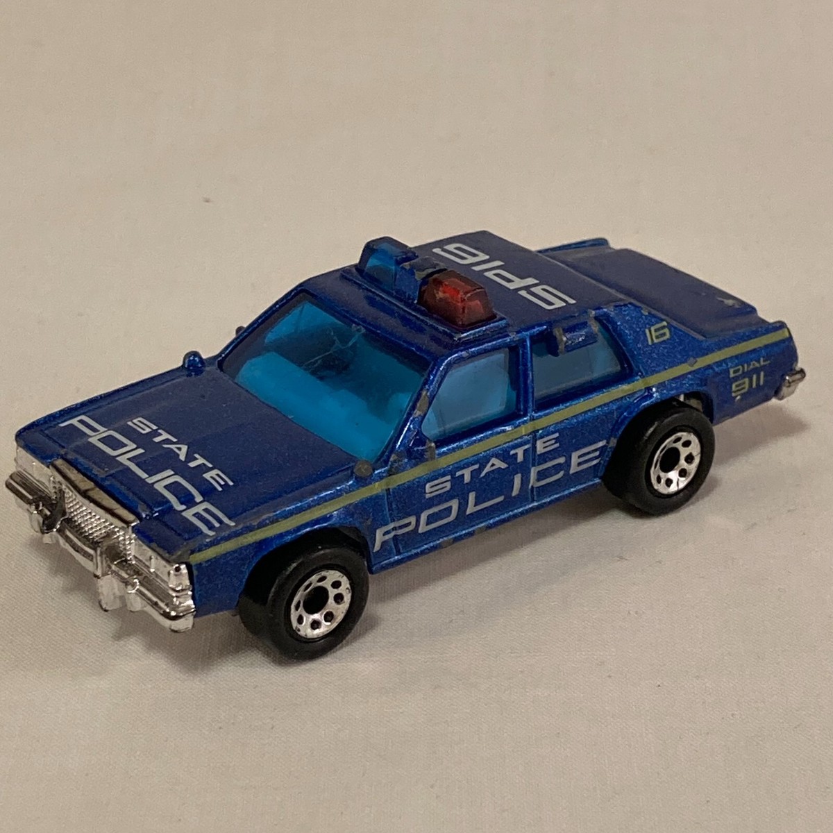 Matchbox 1983-1987 Ford LTD Crown Victoria Blue/Yellow/Wh State