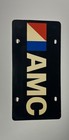ANTIQUE NYLON AMC AMERICAN MOTORS SHOWROOM LICENSE PLATE 1970s
