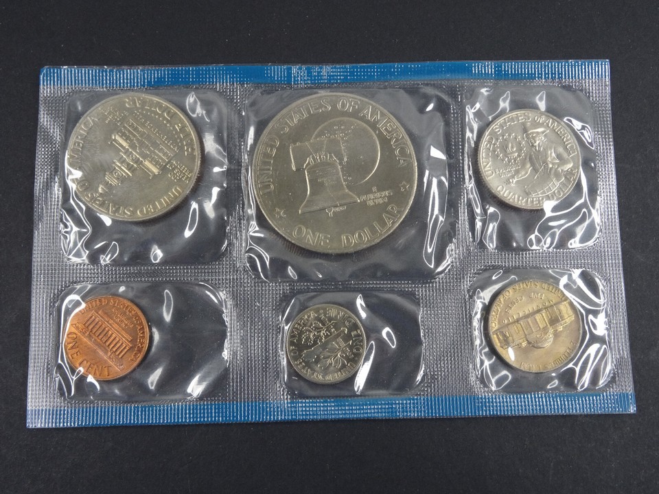 USA 1986-S: Serie Zecca 7 Pezzi Confezione Ufficiale, Con Dollaro In Argento "Ellis Island", In