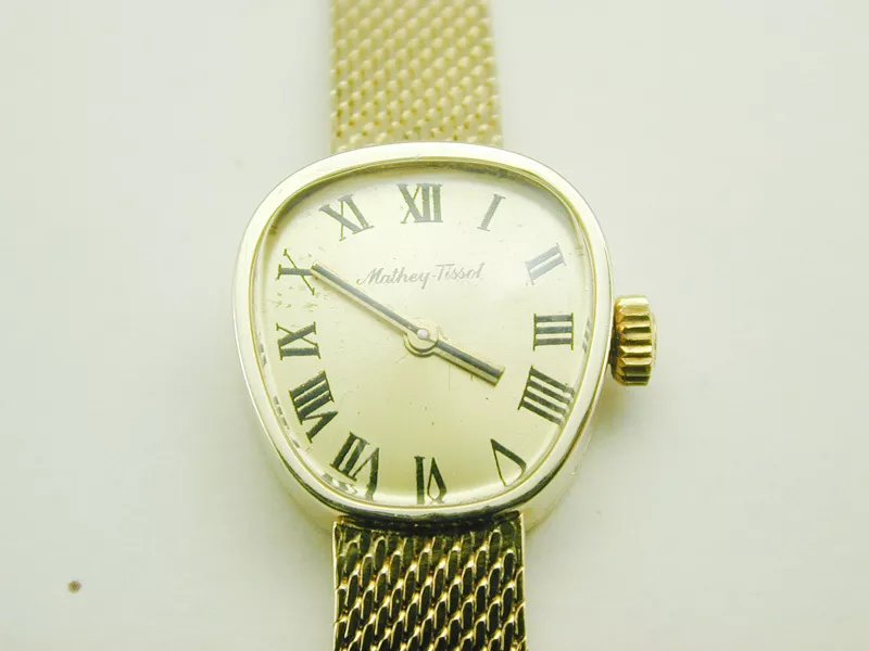 Reloj vintage Tissot Lady 2020 caja de oro amarillo liso 14 k y correa 17 joyas viento