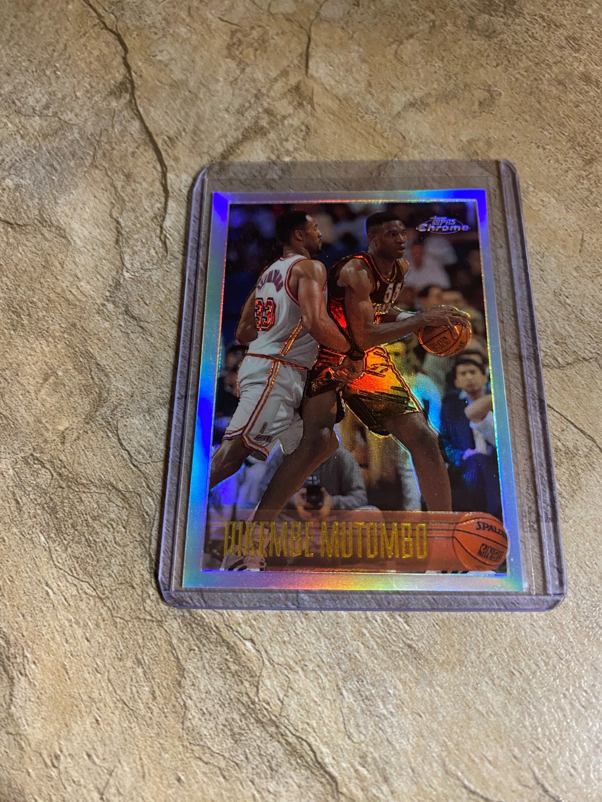 1996-97 Topps Chrome Refractor Dikembe Mutombo #112R
