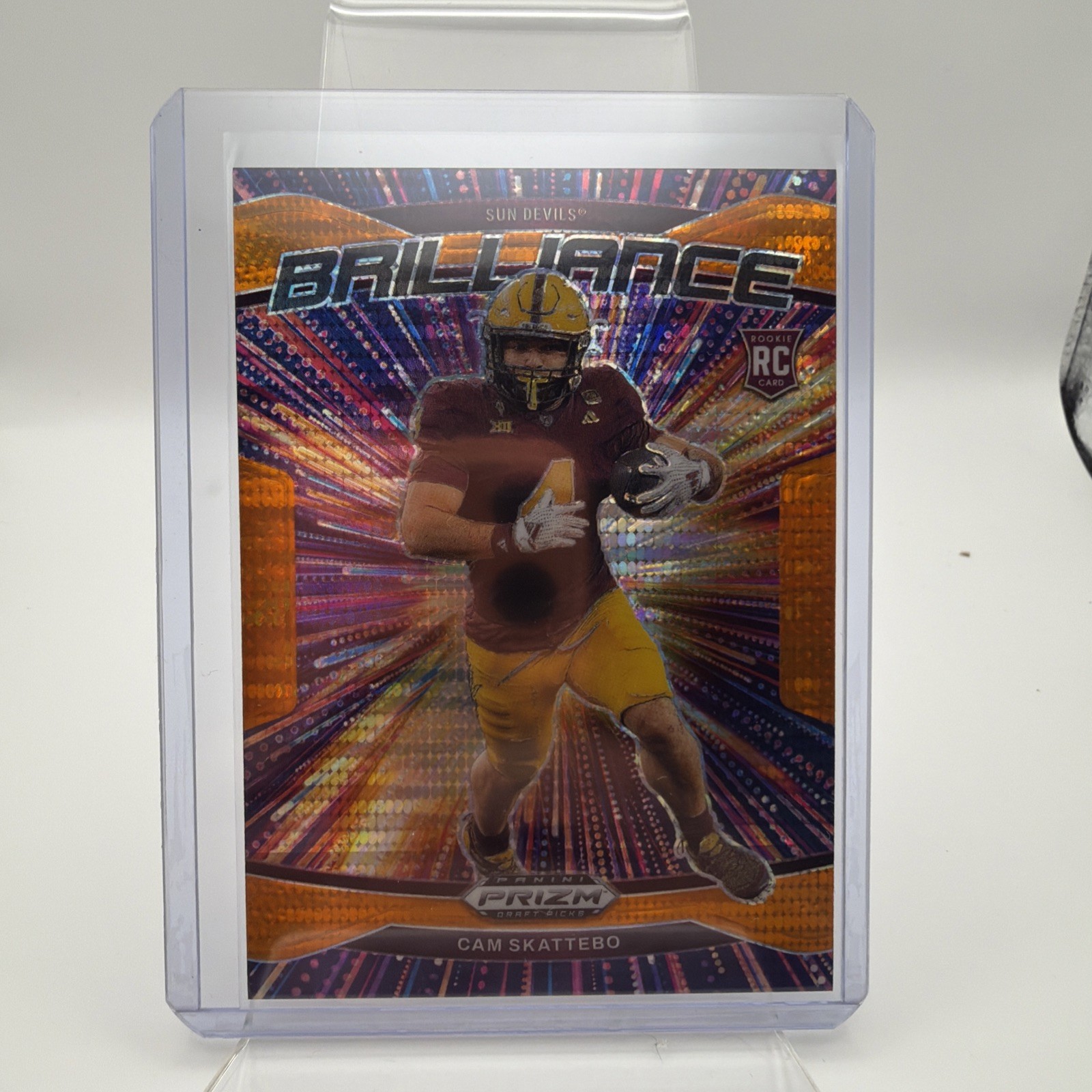 2025 Prizm Draft Picks Cam Skattebo RC Orange Pulsar Brilliance/75