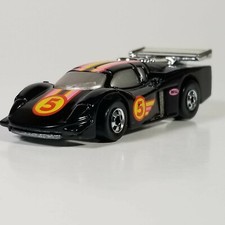 Hot Wheels 1993 "1988 Malaysia" Black GT Racer w/ Red 5  Pink/Yellow Stripe