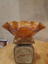 A Fenton Marigold Carnival Glass Stag And Holly Spatula Footed Bowl 8”.