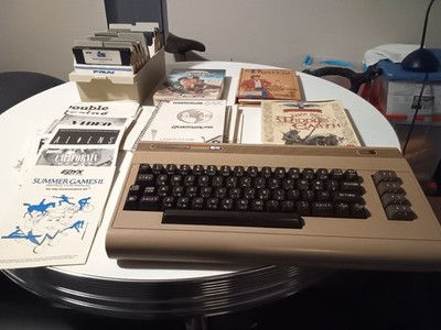 Commodore 64 Computer Only  plus lot of games manuals (no monitor or disk drive)