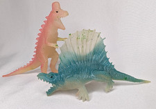 Pair of Clear Hong Kong Dinosaurs rack toy Chinasaur