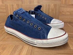 navy blue slip on converse