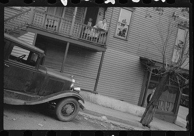 Photo:1930s Street Scene Vintage Ford Car Apartment Balcony Photo