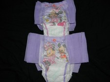 4 Huggies Pull-ups 4t-5t Size made to fit 32 in waist easy.  Minnie 
