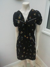 Trolled Dolly Black Dress Size Small. Tea Dress with pattern 