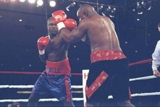 Cedric Boswell and Jermaine Woods throw punches at each other at a- Old Photo