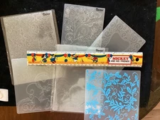 5 darice embossing folders 1 unknown folder. Leaves frame corner scroll used