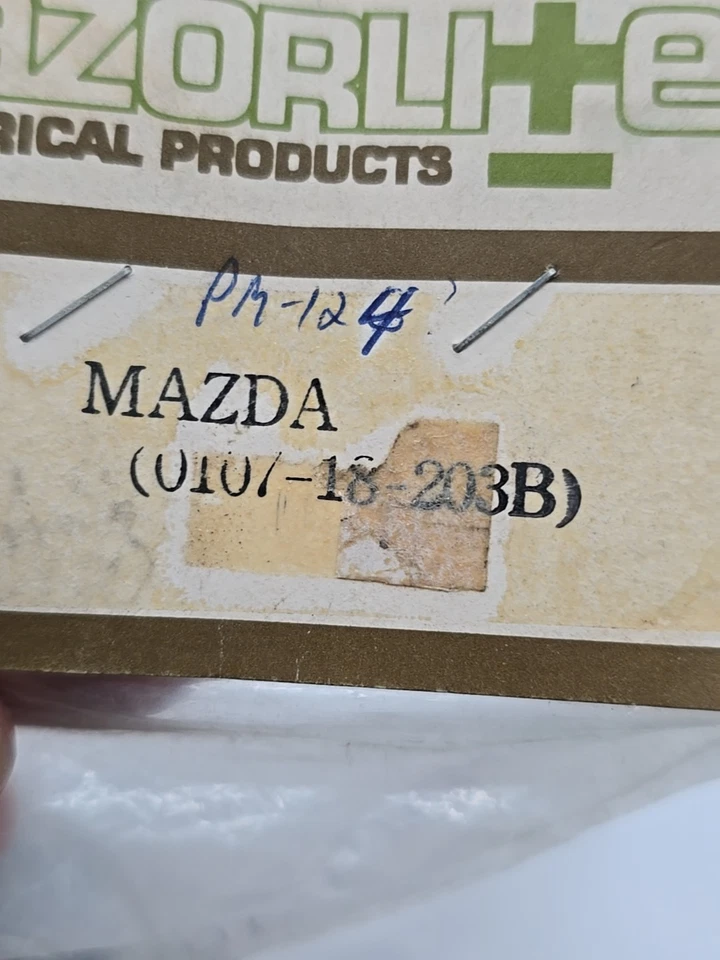 Tapa de distribuidor y rotor para Mazda 1200 sin control de emisiones Foto 4 de 4