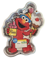 CAKE PAN~ SESAME STREET~ ELMO~ 1995~ ALUMINUM~ 16-3/4 X 12" WILTON #2105-4298