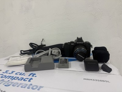 Olympus OM-D E-M5 Camera with BRAND NEW 14-42mm Lens, Flash, And Batteries