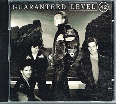 Guaranteed, Level 42, Used; Very Good Book