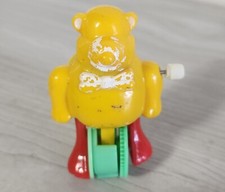Wind Up Yellow Bear on Wheel Non Working Condition NW2
