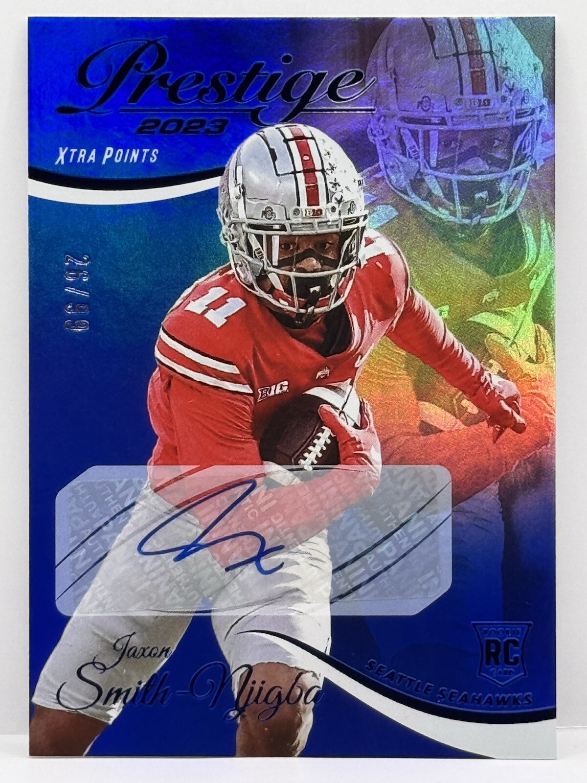 JAXON SMITH NJIGBA 2023 PRESTIGE XTRA POINTS BLUE ROOKIE AUTO /99 SEAHAWKS