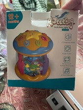 Rotating music, lights for baby