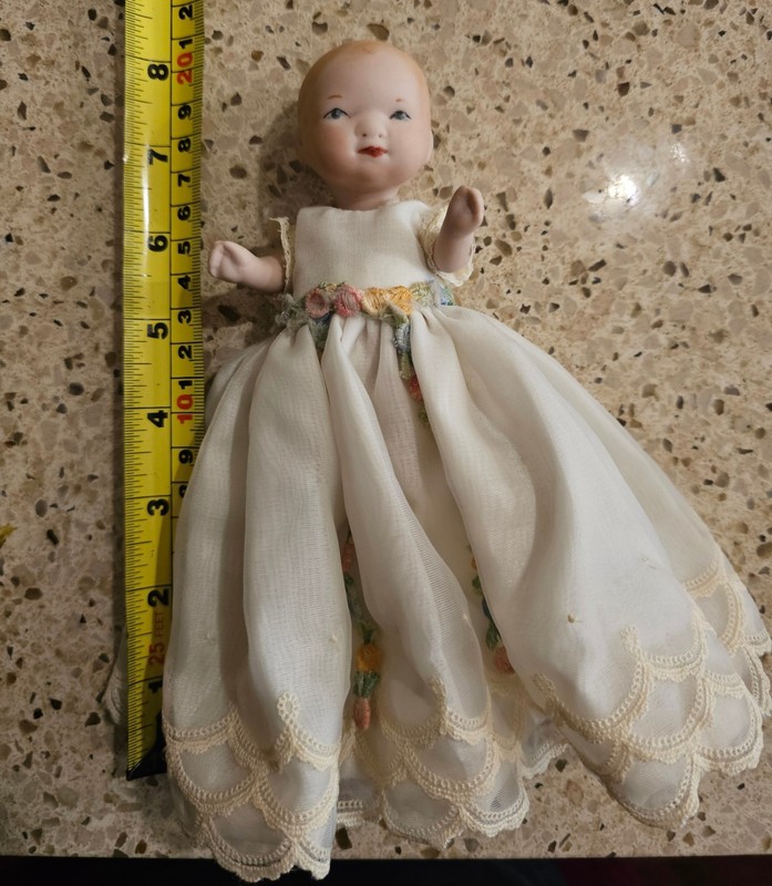Sweet Little Porcelain Doll