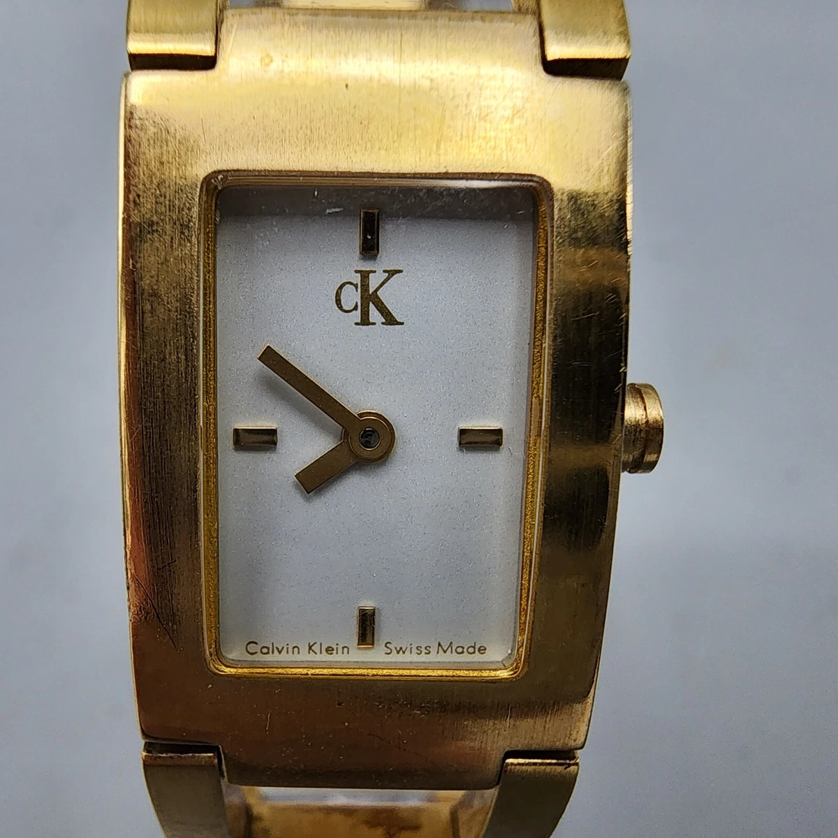 Calvin Klein Watch Women Gold Tone White Dial 17mm Rectangle