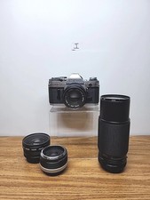 Canon AE-1 35mm SLR Film Camera With 3 Additional Lenses UNTESTED