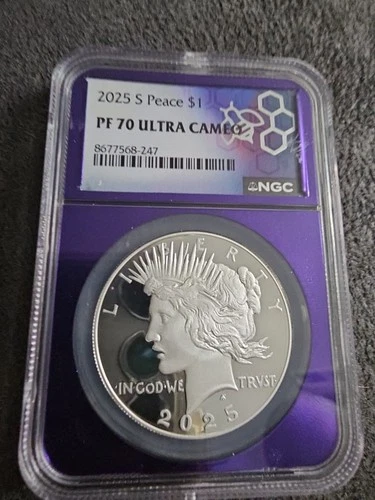 2025  S$1 Peace Dollar NGC PF70 Ultra Cameo TraderBea Purple Core