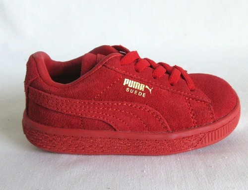 puma red suede on feet