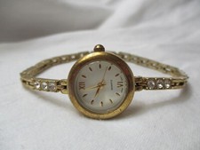 Wristwatch Gold Tone Sparkly Bracelet Band Round White Face Roman Numerals