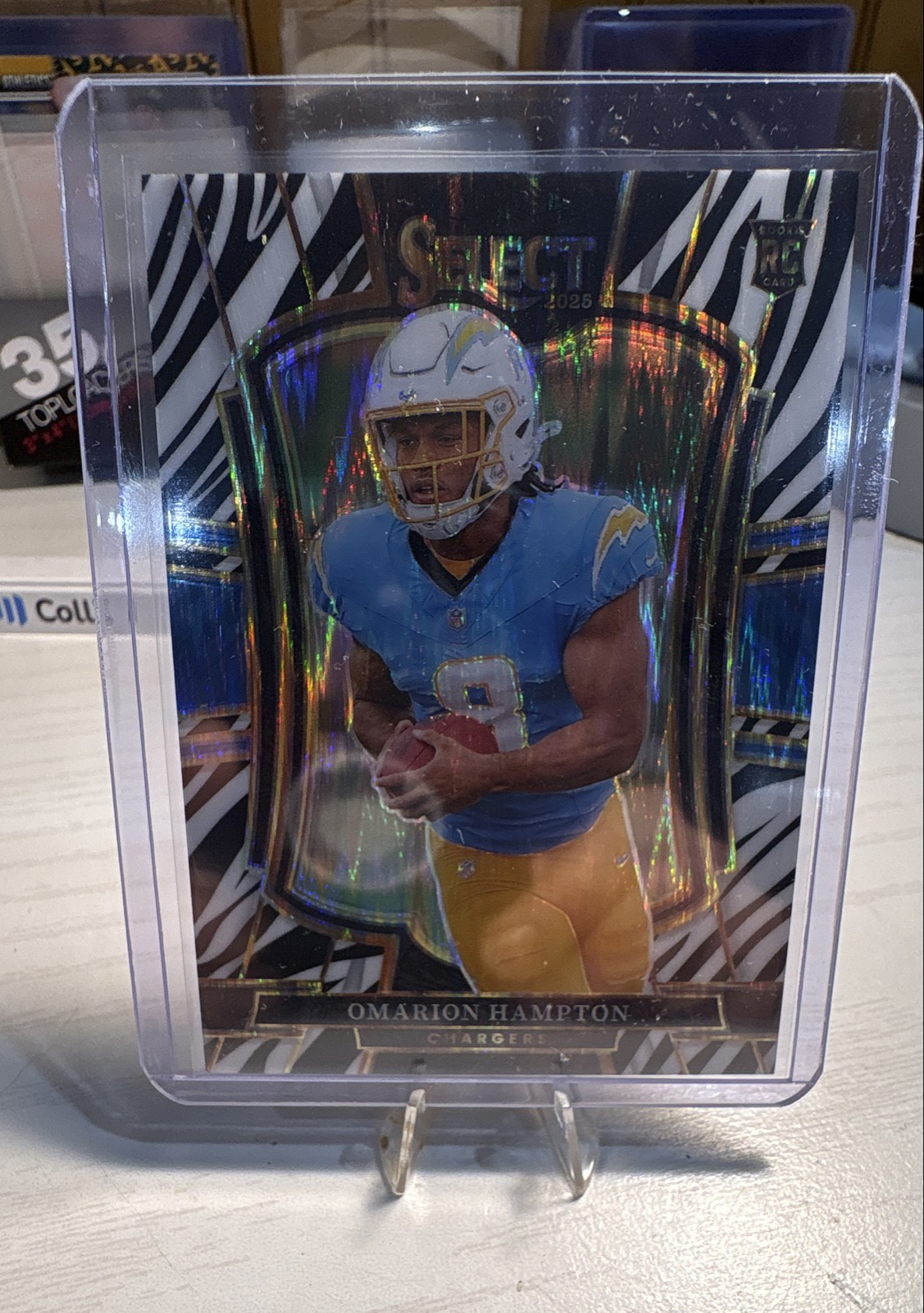 2025 Panini Select - Premier Level Omarion Hampton #102 Zebra Shock Prizm (RC)