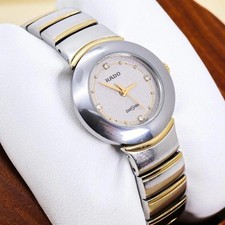 Reloj de cuarzo Rado DiaStar para dama plateado esfera de 4 diamantes dos tonos vintage Japón