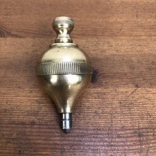 vintage brass plumb bob
