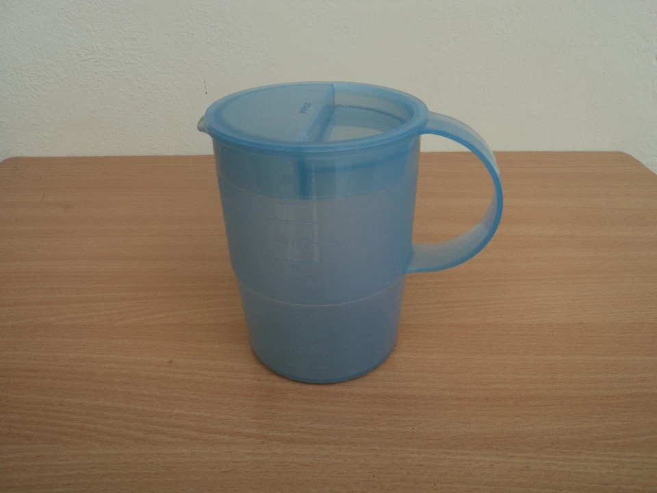 Pichet doseur Tupperware de 1/2Litre  gradué - Couvercle 25ml et 10ml. - Photo 2/4