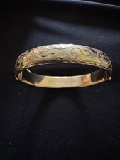 9ct Solid Yellow Gold Hinged Half Patterned Bangle 12.32grams.