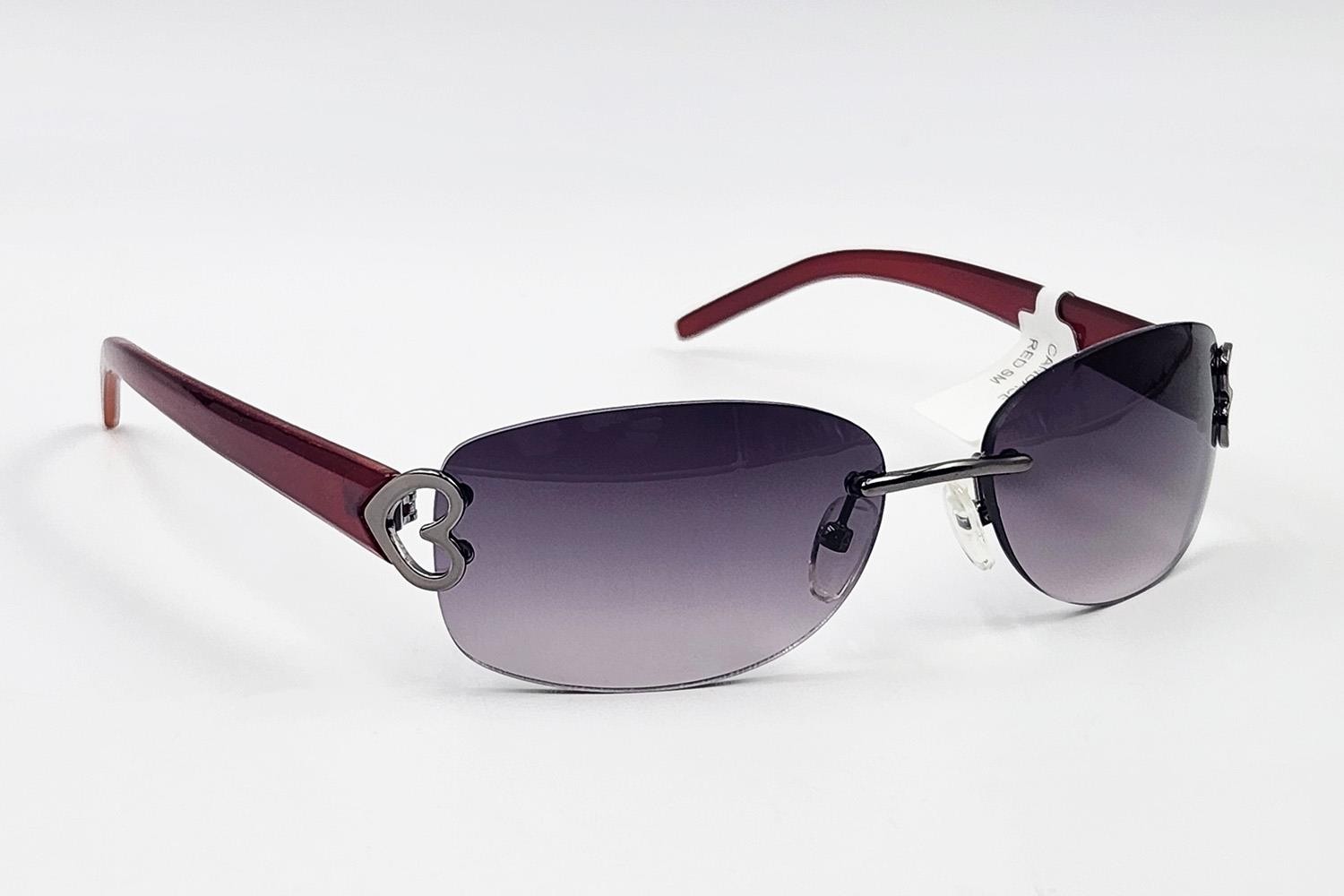 Женские солнцезащитные очки Liz Claiborne без оправы красного цвета с серым градиентом цвета оружейного металла и сердечками 2690₽