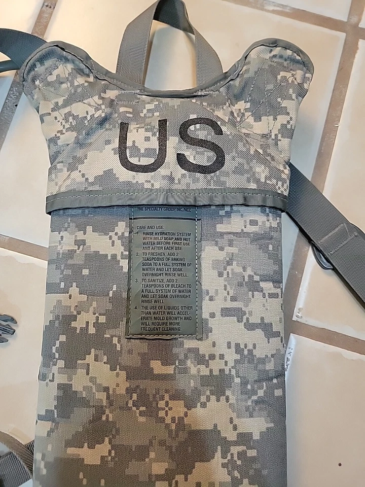 U.S. Military Issued MOLLE 2-Hydration Carrier￼ Complete With Bladder And Pocket - Image 2 of 4