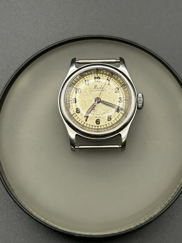 Mido Multifort super-automatic RM 1206 with a MOD 1941 bumper 